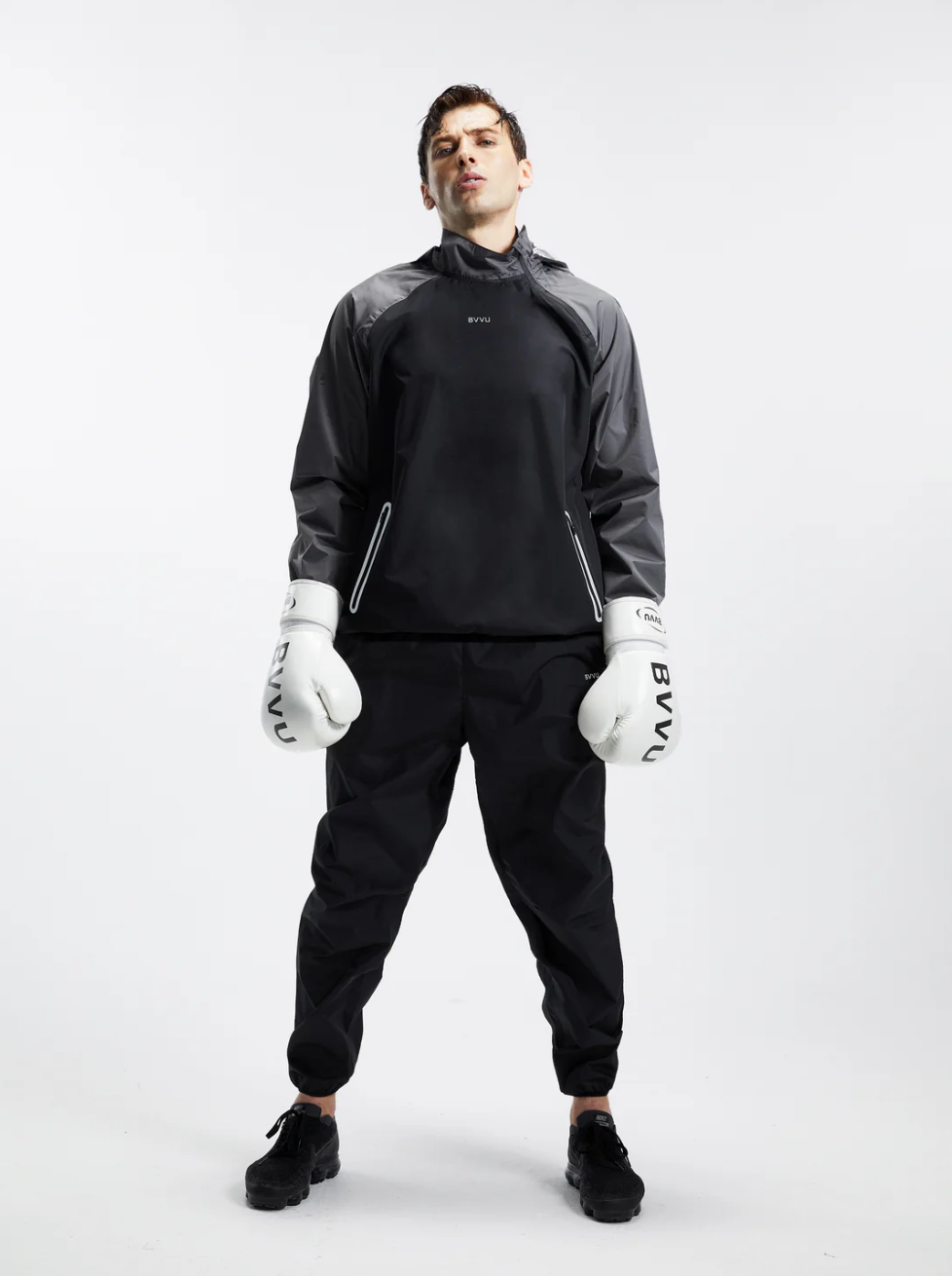 Model posing in the BVVU sauna suit